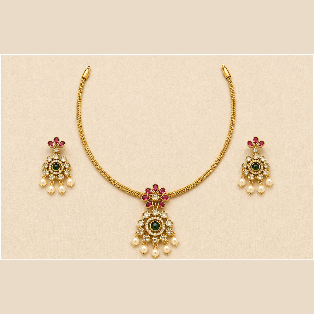 Malarika gold-tone necklace set with ruby pink floral design green centre stone and pearl drops