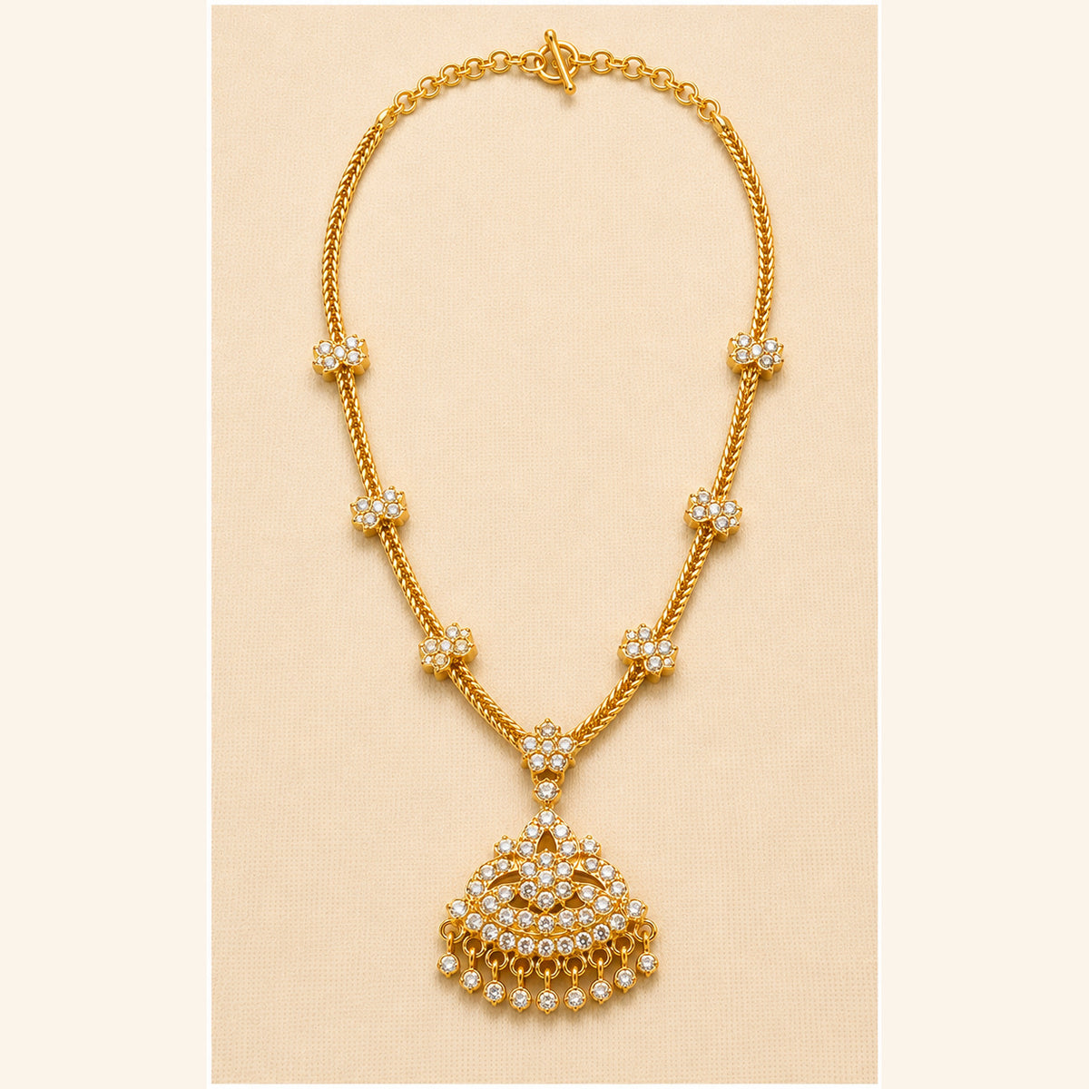 Venilla traditional gold-tone Attigai necklace with floral crystal accents and fan-shaped pendant