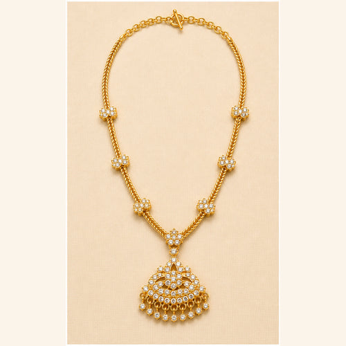 Venilla traditional gold-tone Attigai necklace with floral crystal accents and fan-shaped pendant
